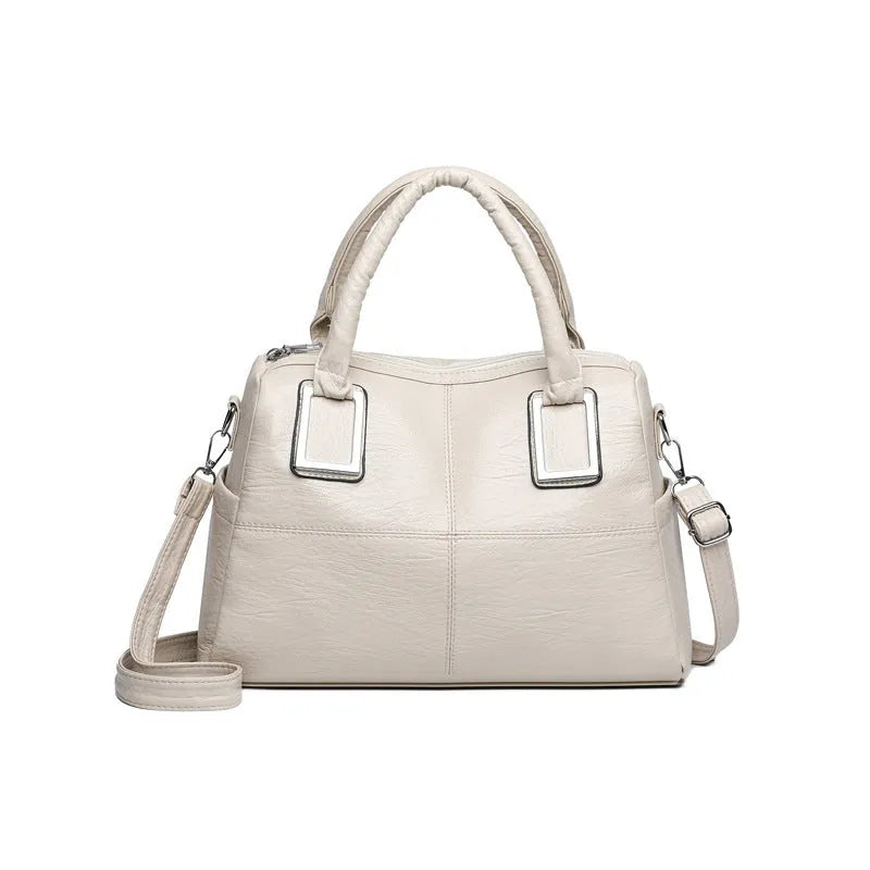 Women's square shoulder bag in wear-resistant material with internal organisers