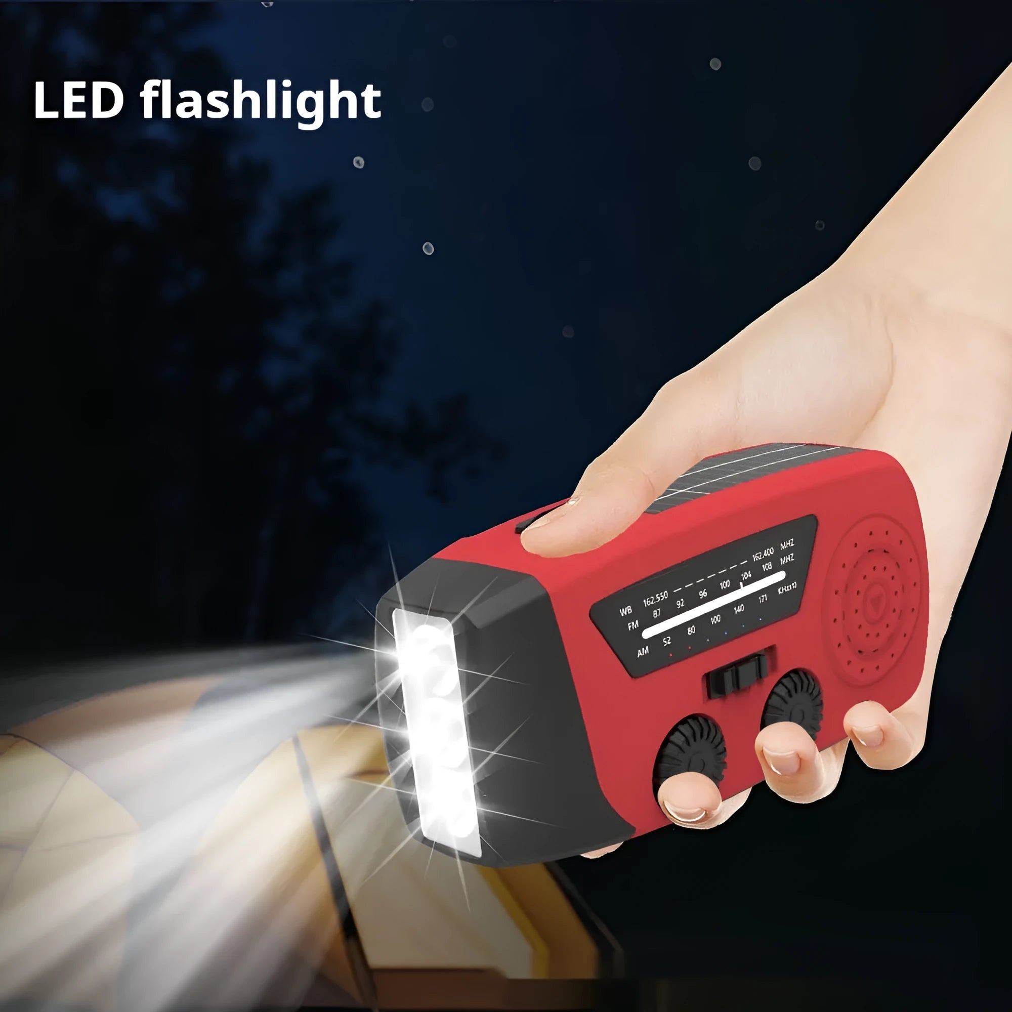Red rechargeable hand torch with AM/FM radio, wrist strap, and USB charging interface