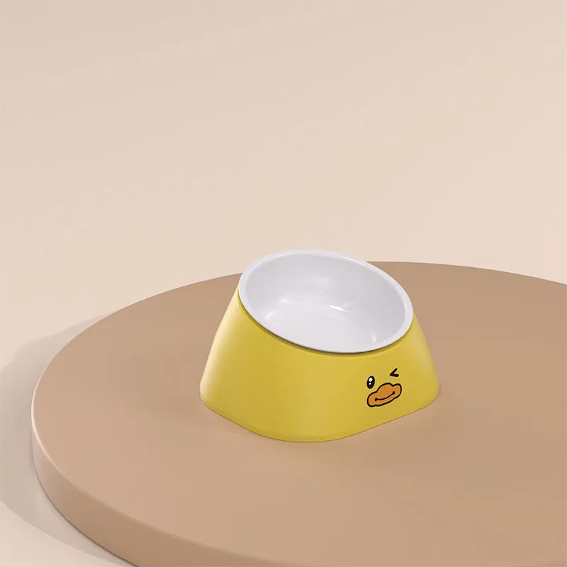 Green tilted stainless steel pet bowl with white PP base at 15-degree angle for cat or dog feeding