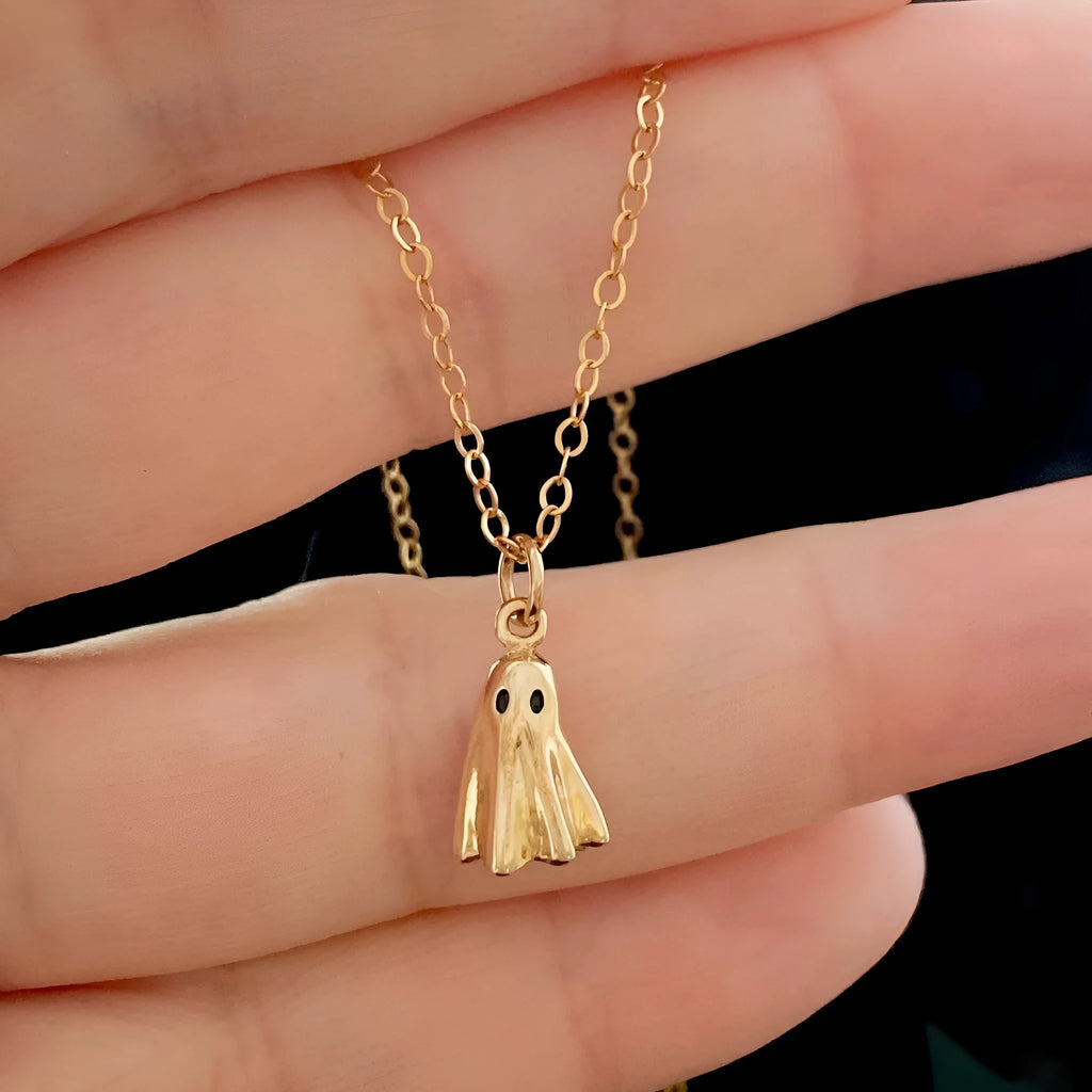 Ghost pendant necklace with titanium steel pendant on a twisted stainless steel chain.