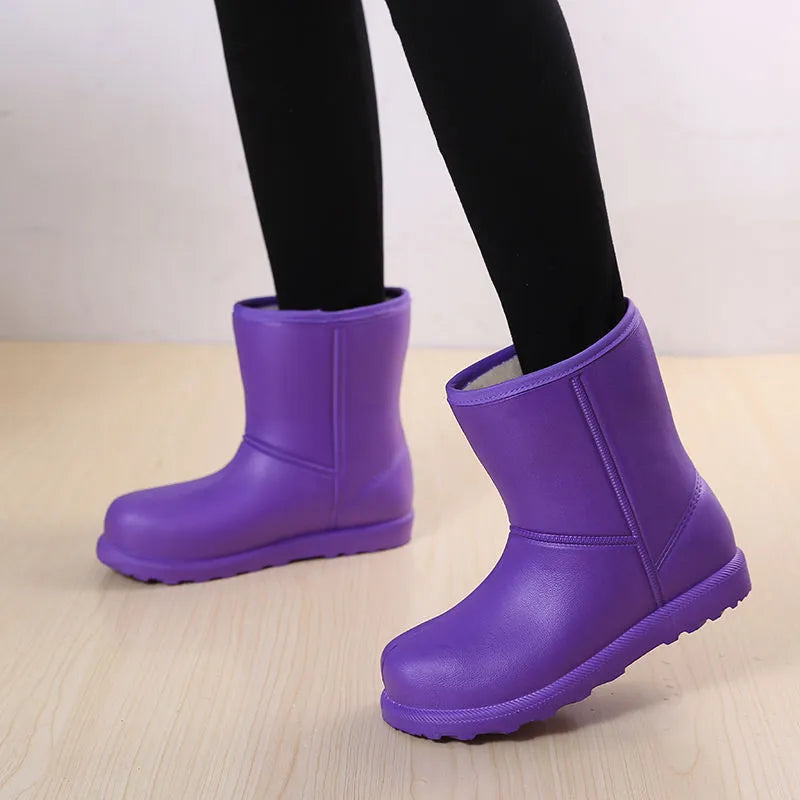 Women's mid-calf EVA waterproof snow boots with velvet lining, platform heel, round toe, in black