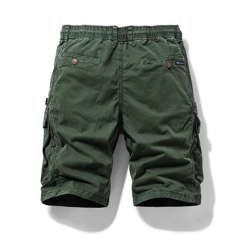 Men's cotton shorts in army green with multiple pockets and zipper closure in Korean style cut