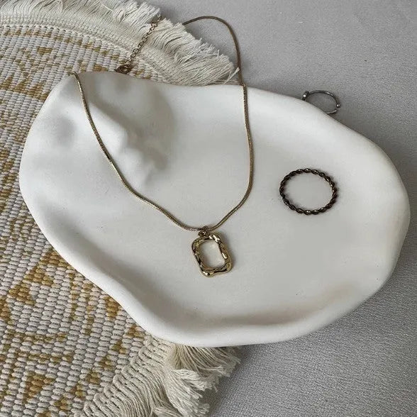 Vintage French relief gypsum jewellery display plate with sculptural plaster design and white matte finish
