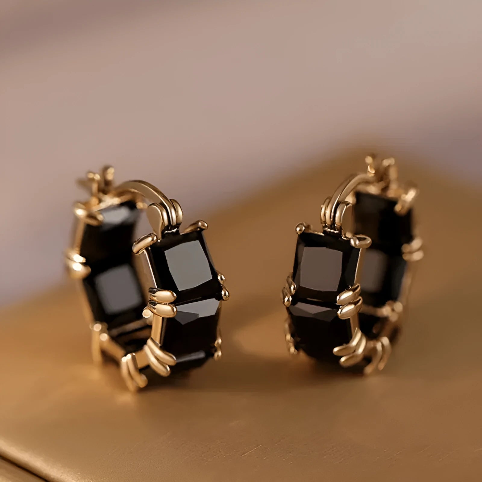 Gold-plated geometric U-shaped earrings with round black zircon crystal stones
