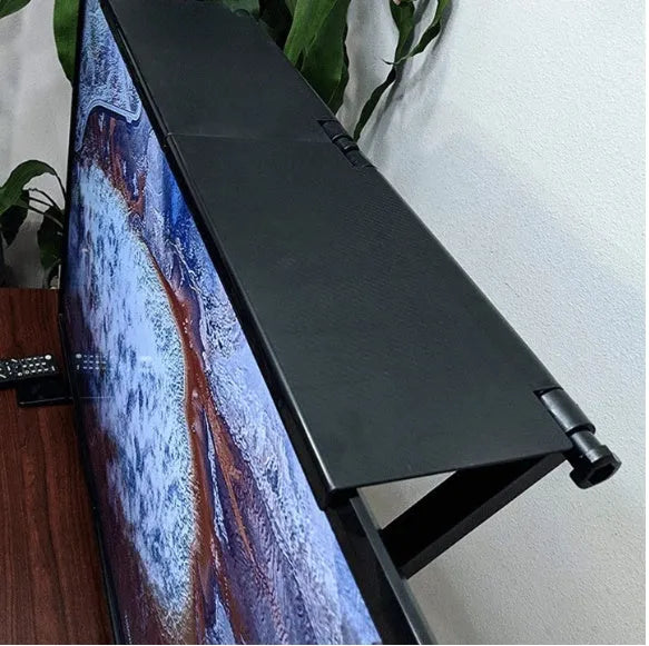 Adjustable black screen top shelf compatible with Apple TV and Roku, 13-inch size, on a computer monitor