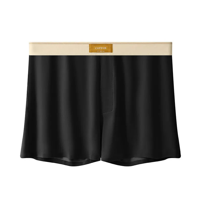 Men's solid colour loose Ice Silk underwear briefs on a neutral background