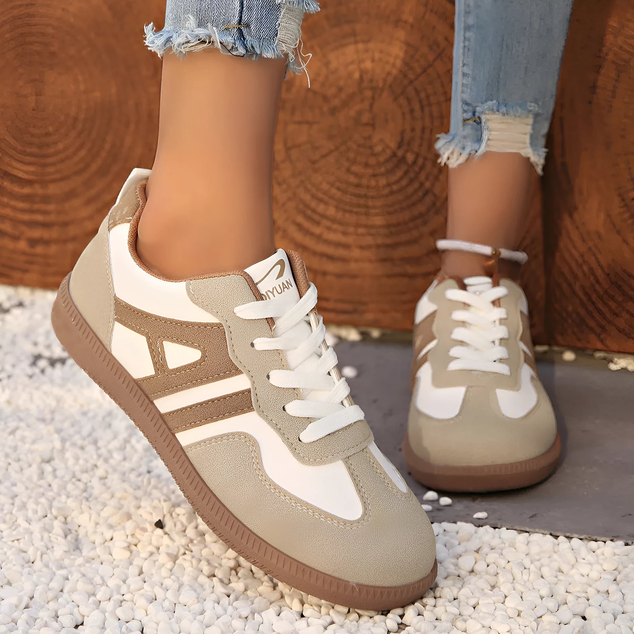 Women's retro colour matching lace-up trainers in black, grey or khaki with low heel platform and cross strap details