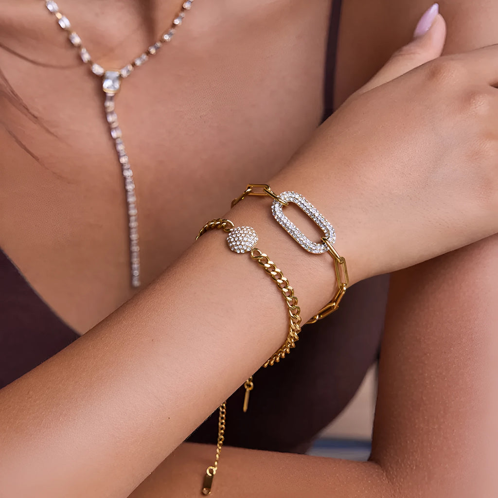 Stainless steel electroplated geometric round link bracelet for women on white background