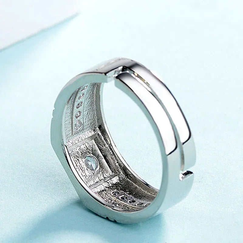 Geometric white gold moissanite ring for men with clean lines and brilliant stone
