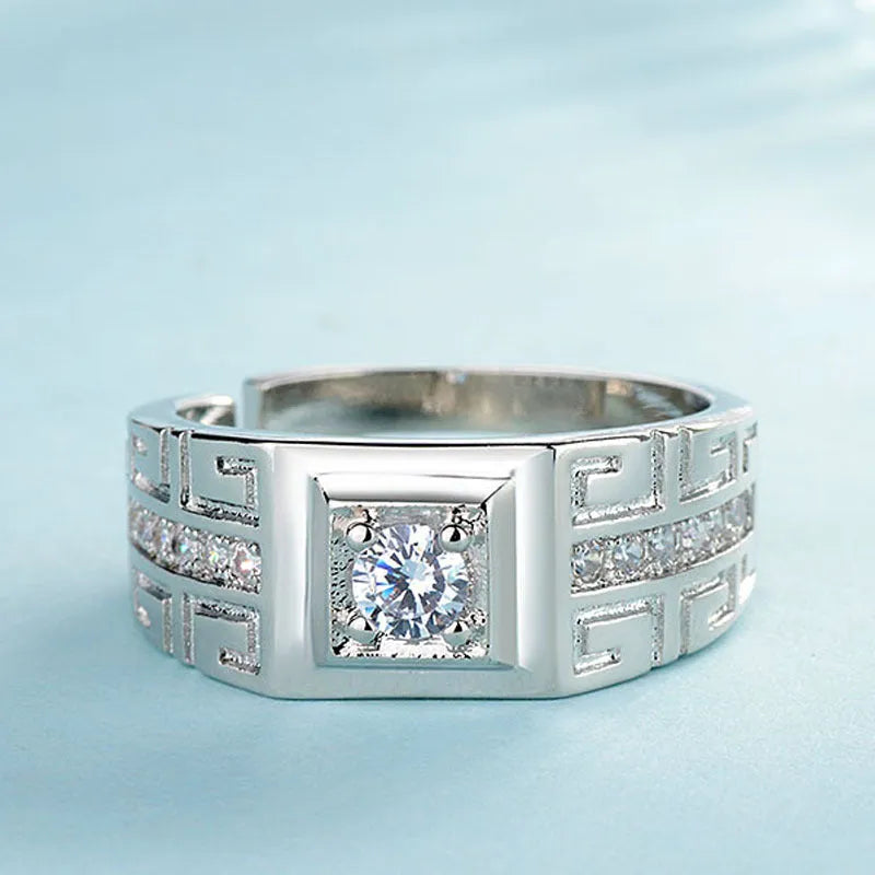 Geometric white gold moissanite ring for men with clean lines and brilliant stone