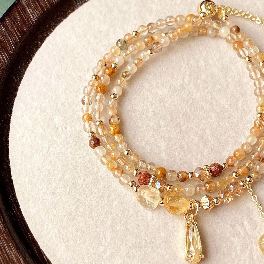 Natural citrine multi-layer hair crystal bracelet in gold electroplated finish with Saturn design element