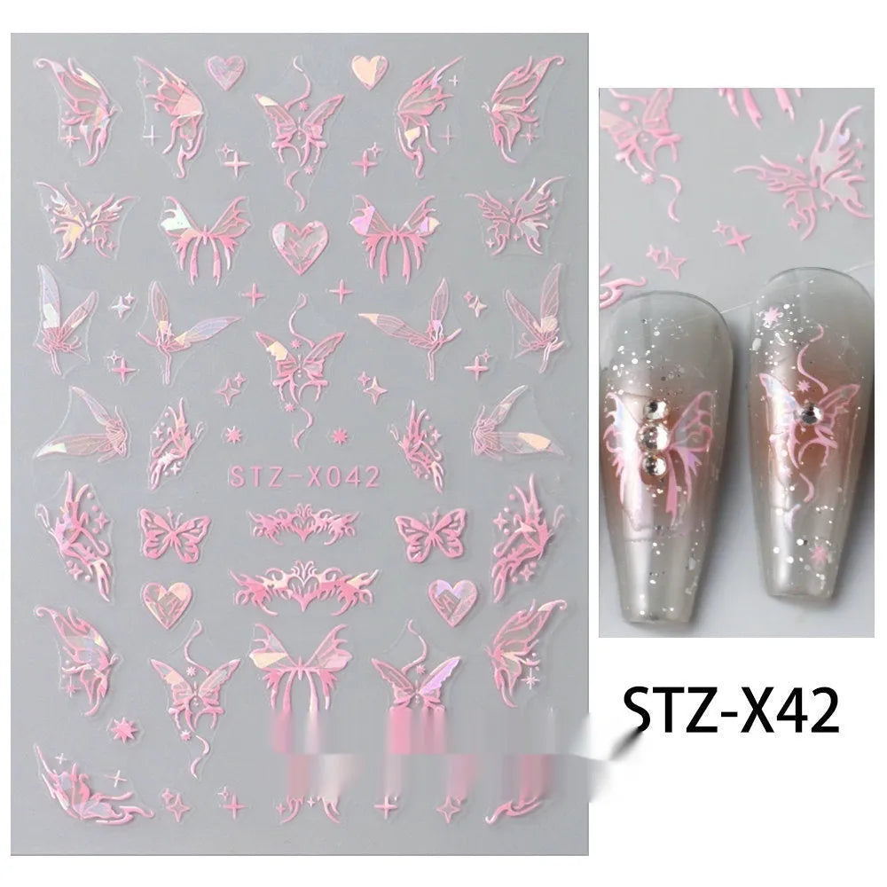 Sheet of black and silver strip nail art stickers with cartoon and love heart designs