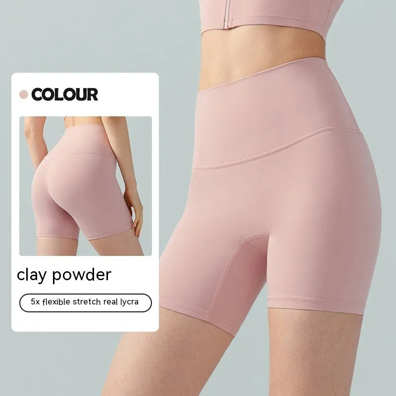 Women's lycra yoga tight shorts in leaf green colour showing high waist and short length design