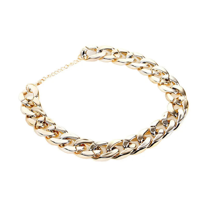 Geometric twisted chain dog collar in metallic colours showing adjustable buckle and chain links