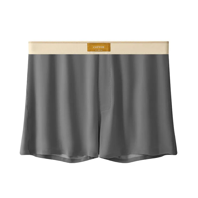 Men's solid colour loose Ice Silk underwear briefs on a neutral background