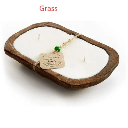 Lavender-coloured wooden basin containing a soy wax aromatherapy candle with three wicks.