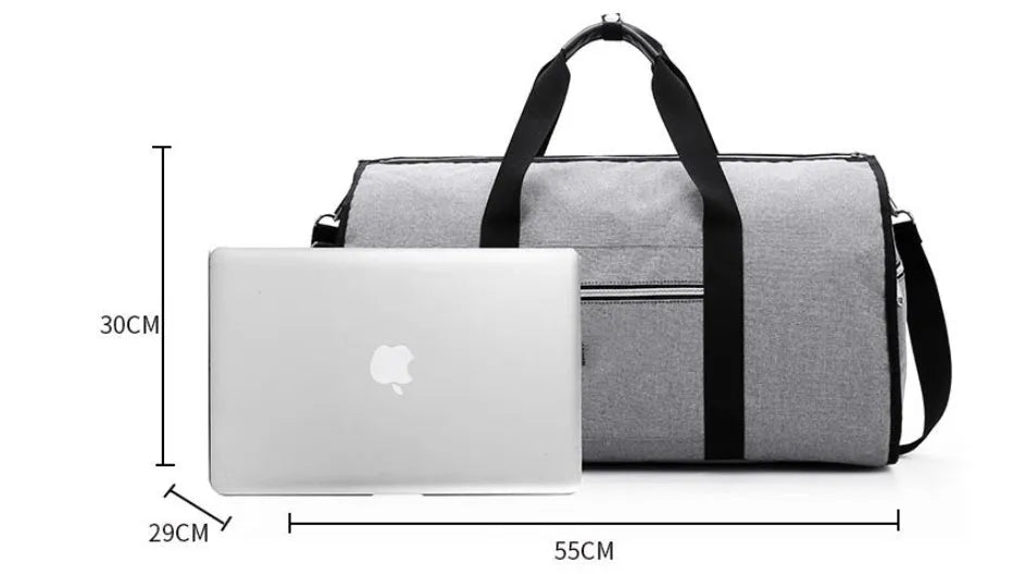 Medium cylinder travel bag in Oxford cloth, shown in black, with zipper open to reveal internal pocket.