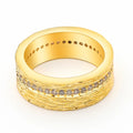 Gold geometric women's ring with clear zircon stone on copper band.