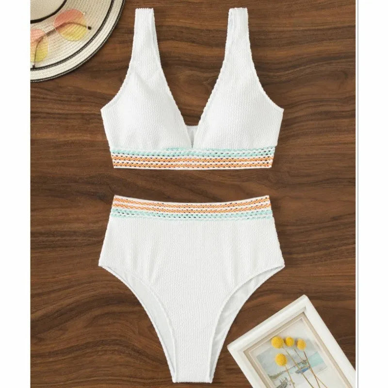 Women's high waist bikini set in solid pink colour, made from nylon fabric.