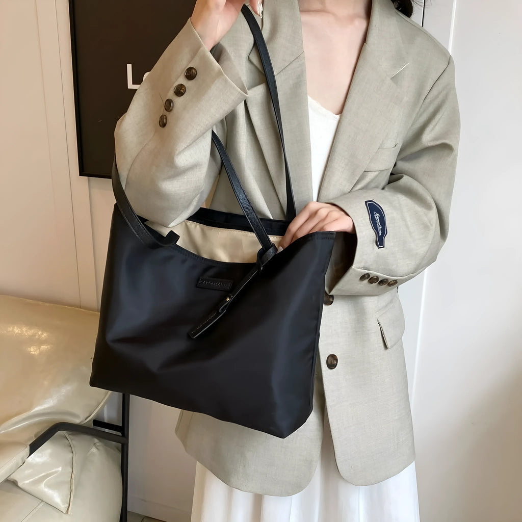 Women's large capacity soft Oxford cloth shoulder bag in black, horizontal square shape with double straps