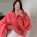 Women's watermelon red sleeveless hooded pullover sweater in loose fit made from mulberry silk