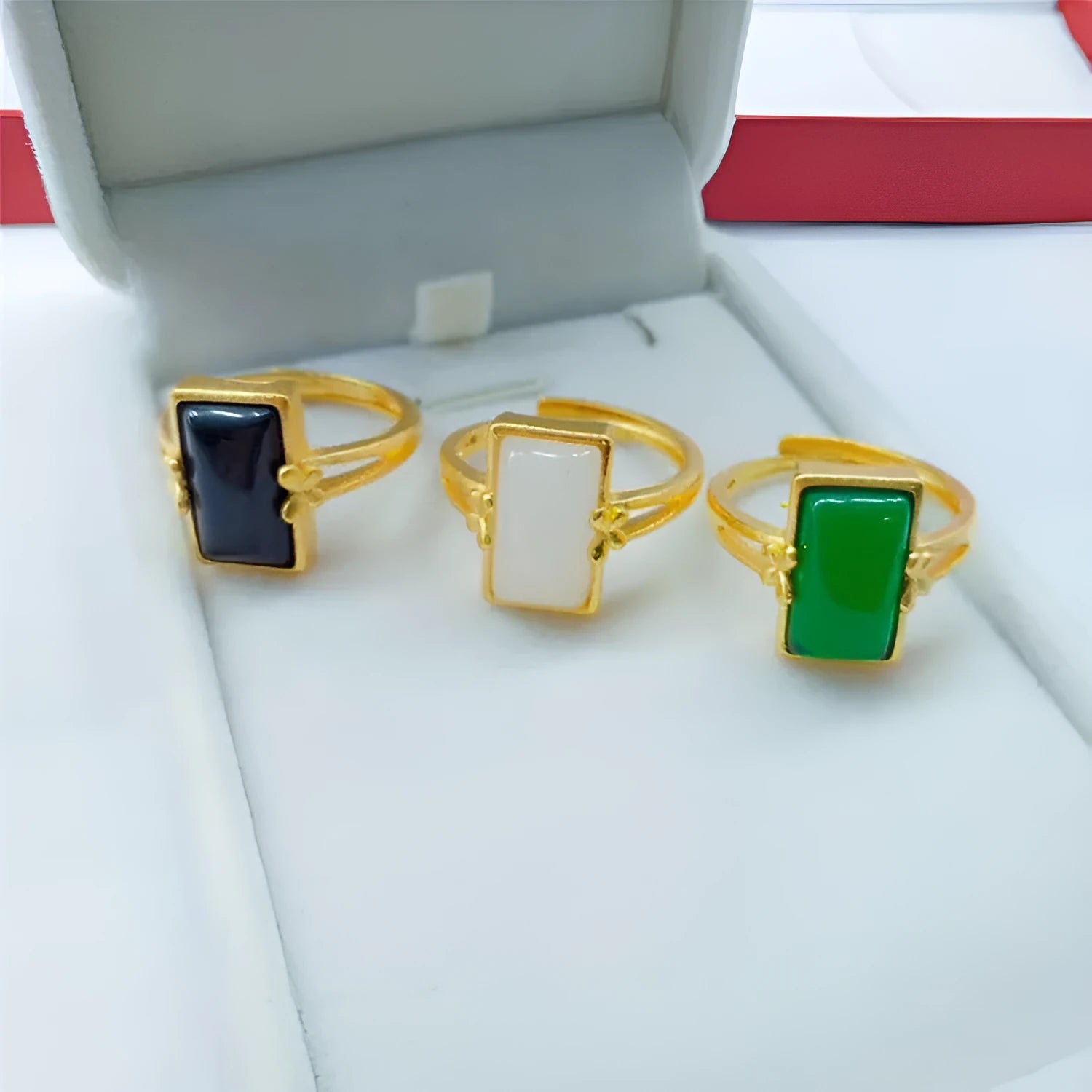 Adjustable brass gold-plated ring with electroplated finish showing gemstone inlay in national style design
