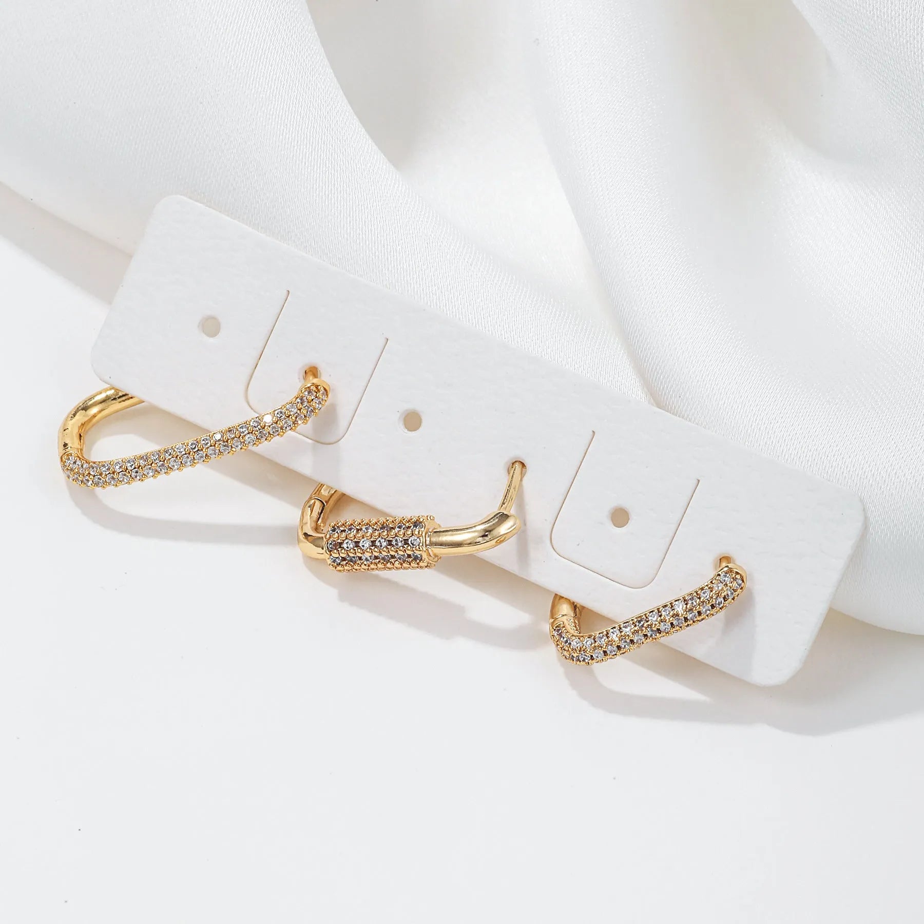 Geometric three-piece ear clip set with micro inlaid zircon stones in gold or white colour