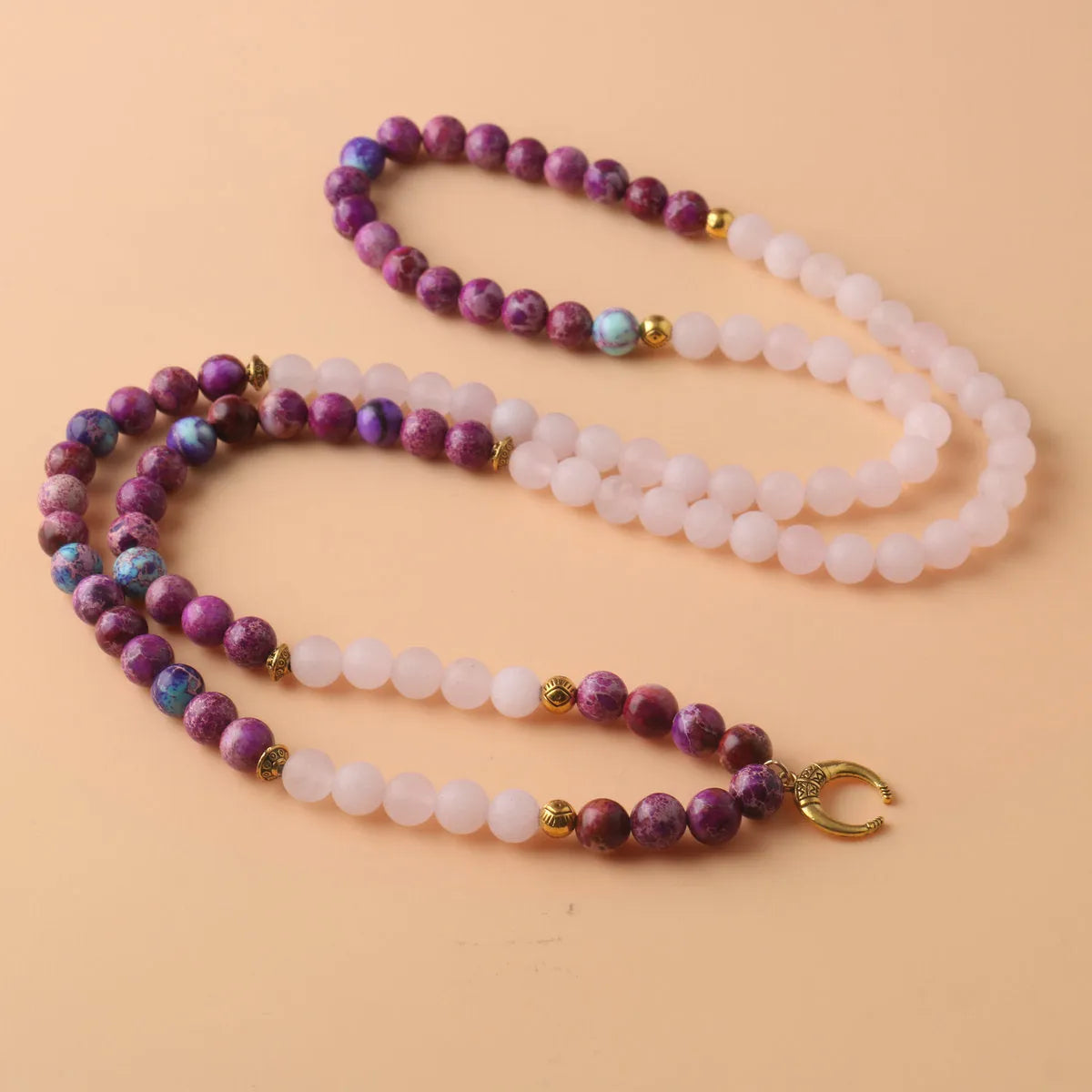 Round pink crystal and Emperor Stone beads pendant necklace on model