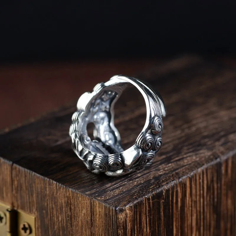 Silver open ring with detailed animal and zodiac modelling in jibeast pattern, retro style