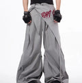 Boy modelling black wide-leg Korean-style summer pants on a casual backdrop.