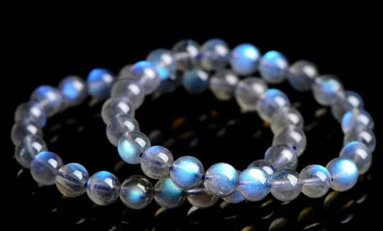 Natural cream body blue moonlight crystal bracelet with minimalist design showing ground finish stone