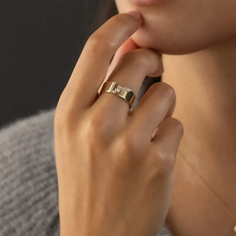 Women's gold electroplated copper ring with shining zircon detail showing personality style design
