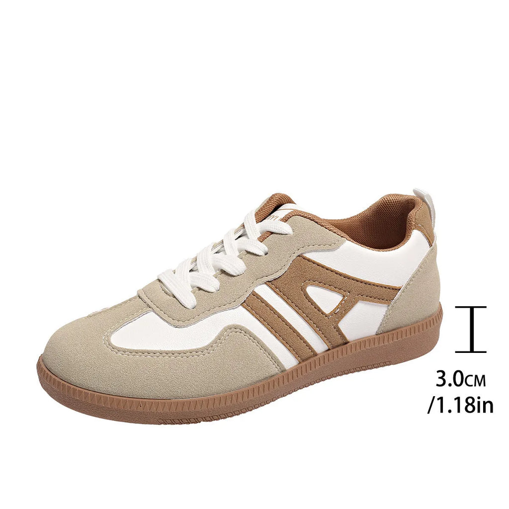 Women's retro colour matching lace-up trainers in black, grey or khaki with low heel platform and cross strap details
