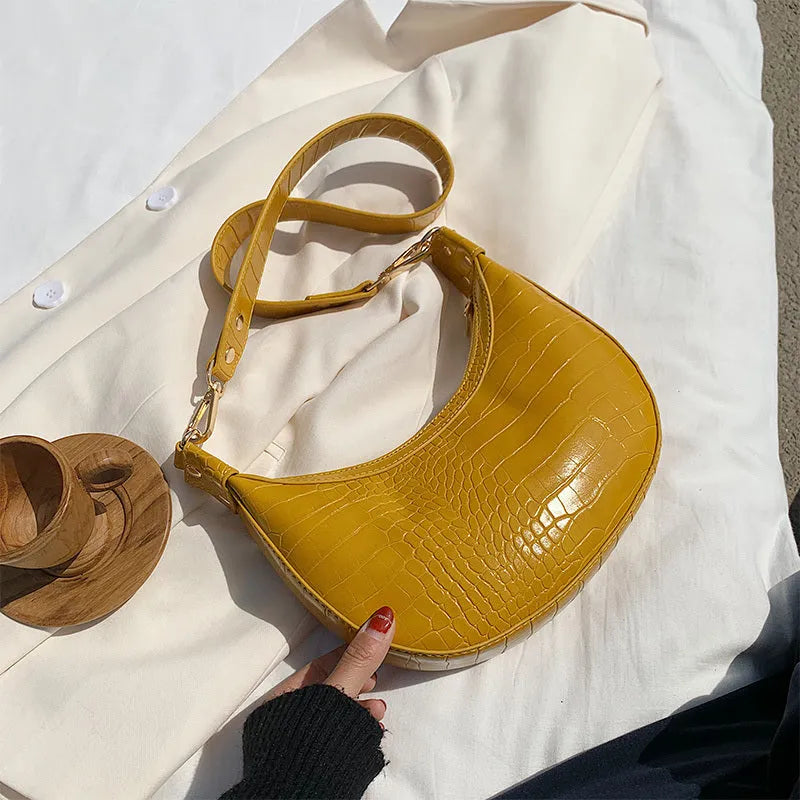 Fairy dumpling bag in PU with crossbody strap, 24cm wide, available in multiple colours