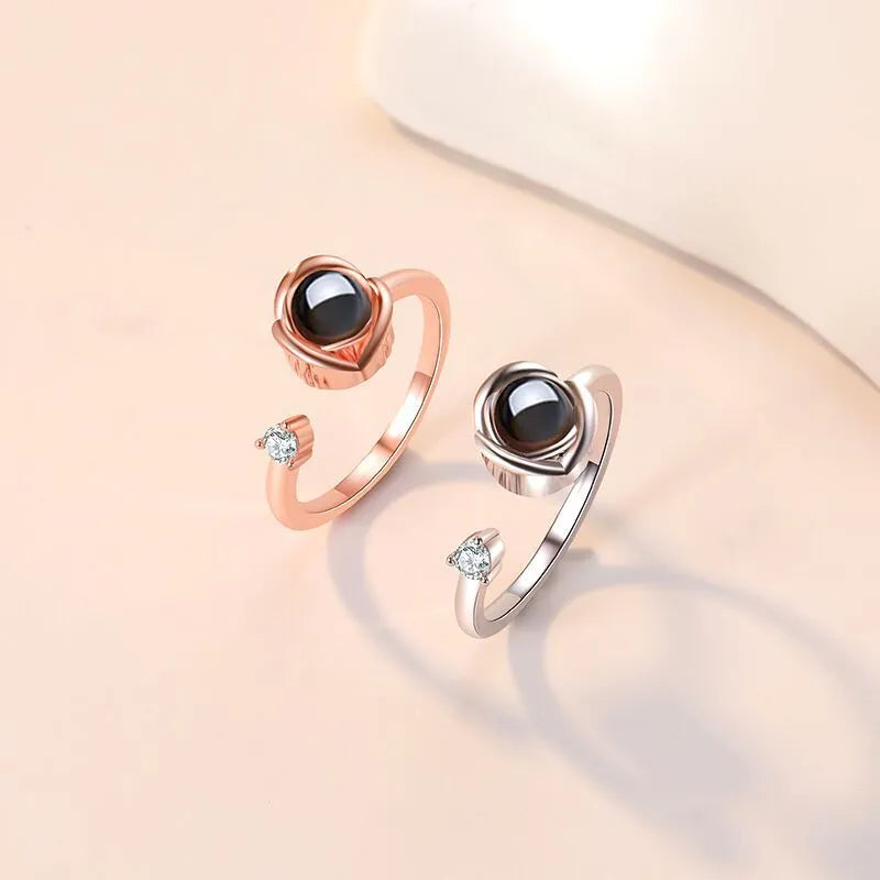 Pair of adjustable copper couple rings with electroplated rose gold and platinum finishes