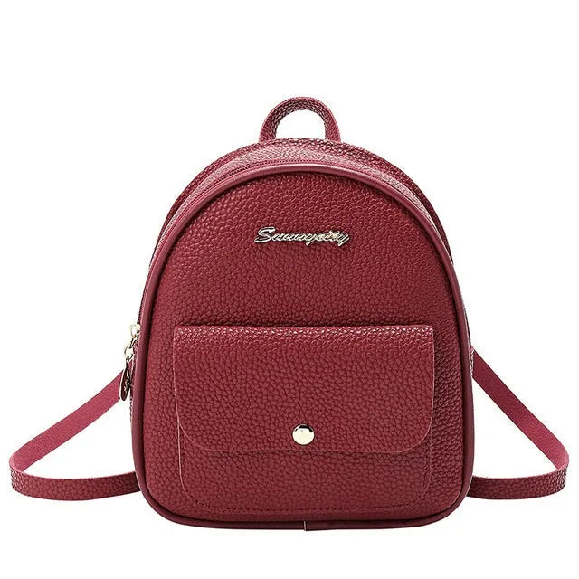 Women's small black PU backpack purse with letter design and zipper closure