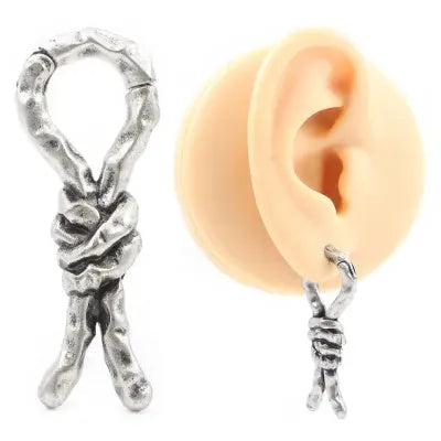 Close-up of a copper bending and connecting earring for cartilage piercing, 4mm in size.
