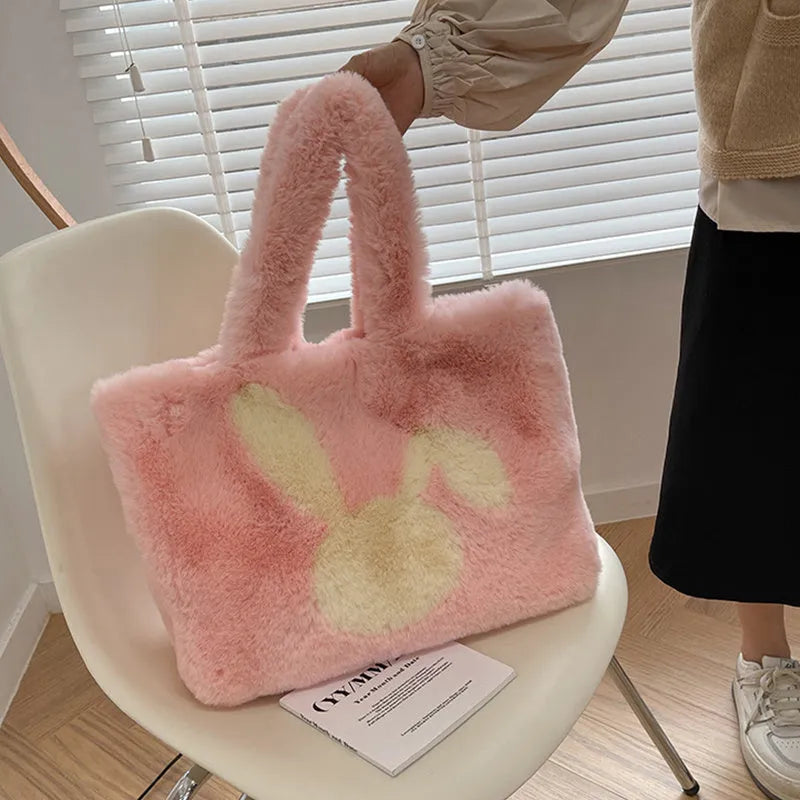 Plush shoulder bag with cartoon rabbit ears design in six colour options