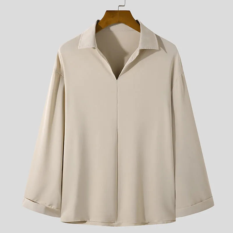 Loose lapel casual pullover shirt in solid colour on a hanger.