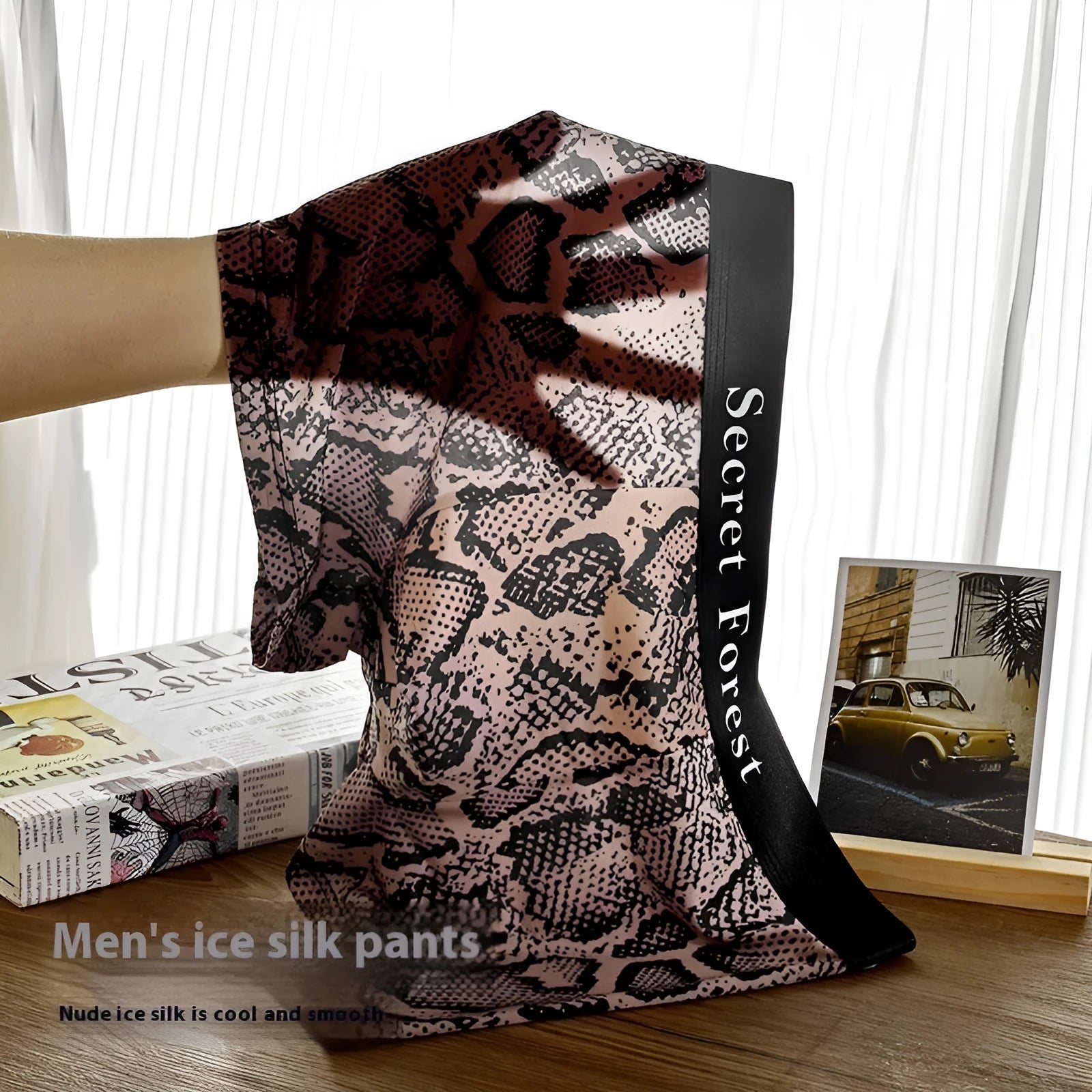 Men's thin loose knit polyester boxer shorts in black, grey, or brown colours on a mid-waist fit