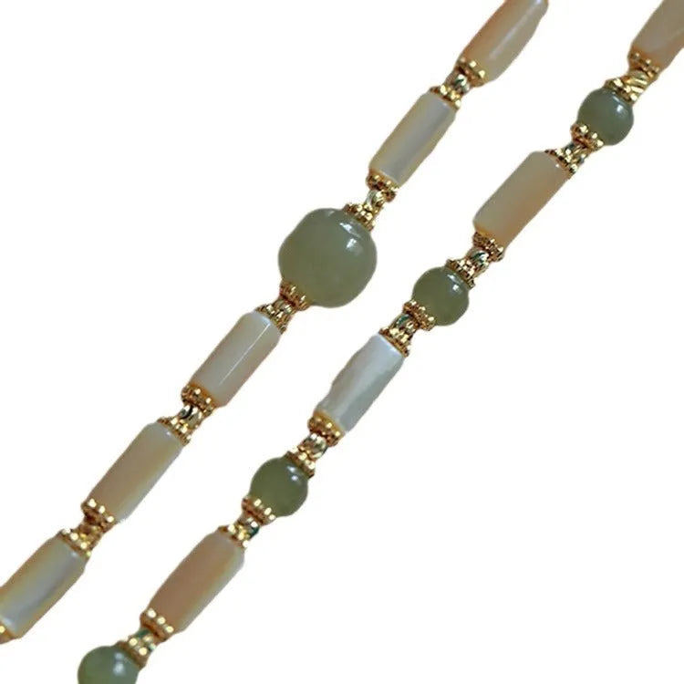 Handmade bamboo bracelet with green Hetian jade beads and 925 silver beads, lotus seedpod design
