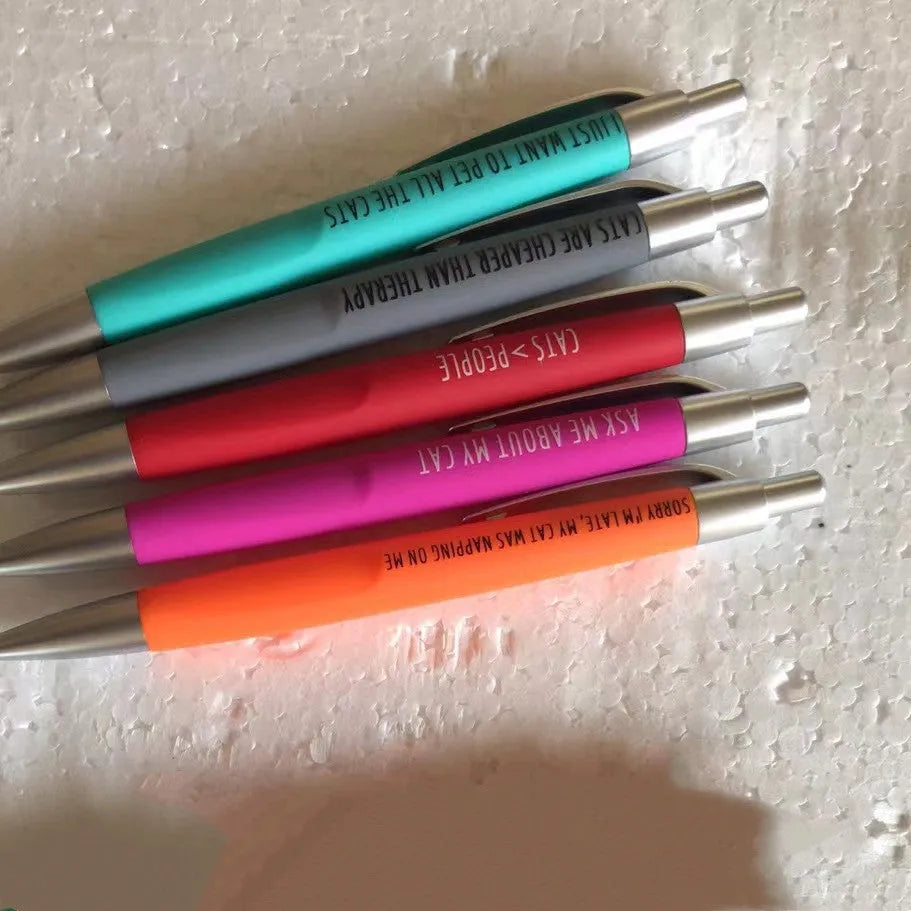 Set of five automatic push-button pens with a beaded fabric storage bag