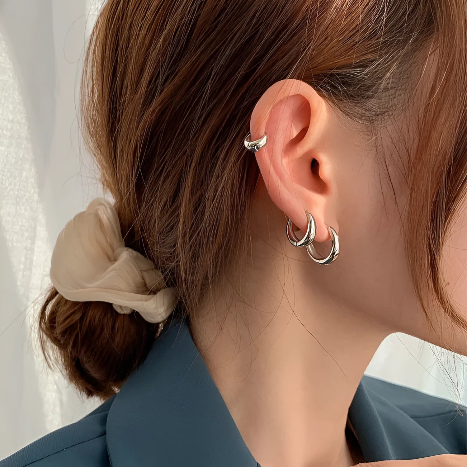 Women's gold and silver water drop earrings in geometric minimalist design with three size options