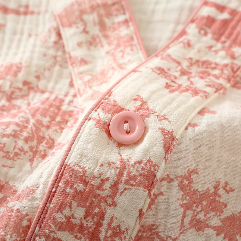 Women's pink pure cotton gauze lounge set with lace-up trousers and long sleeve top.
