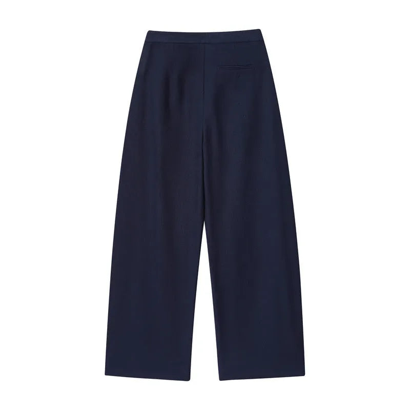Women's linen blend long sleeve shirt with flounce detail and matching wide leg trousers set on a hanger.
