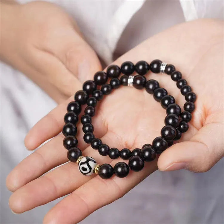 Ebony Tibetan beads bracelet with 8mm wood beads in two-circle design