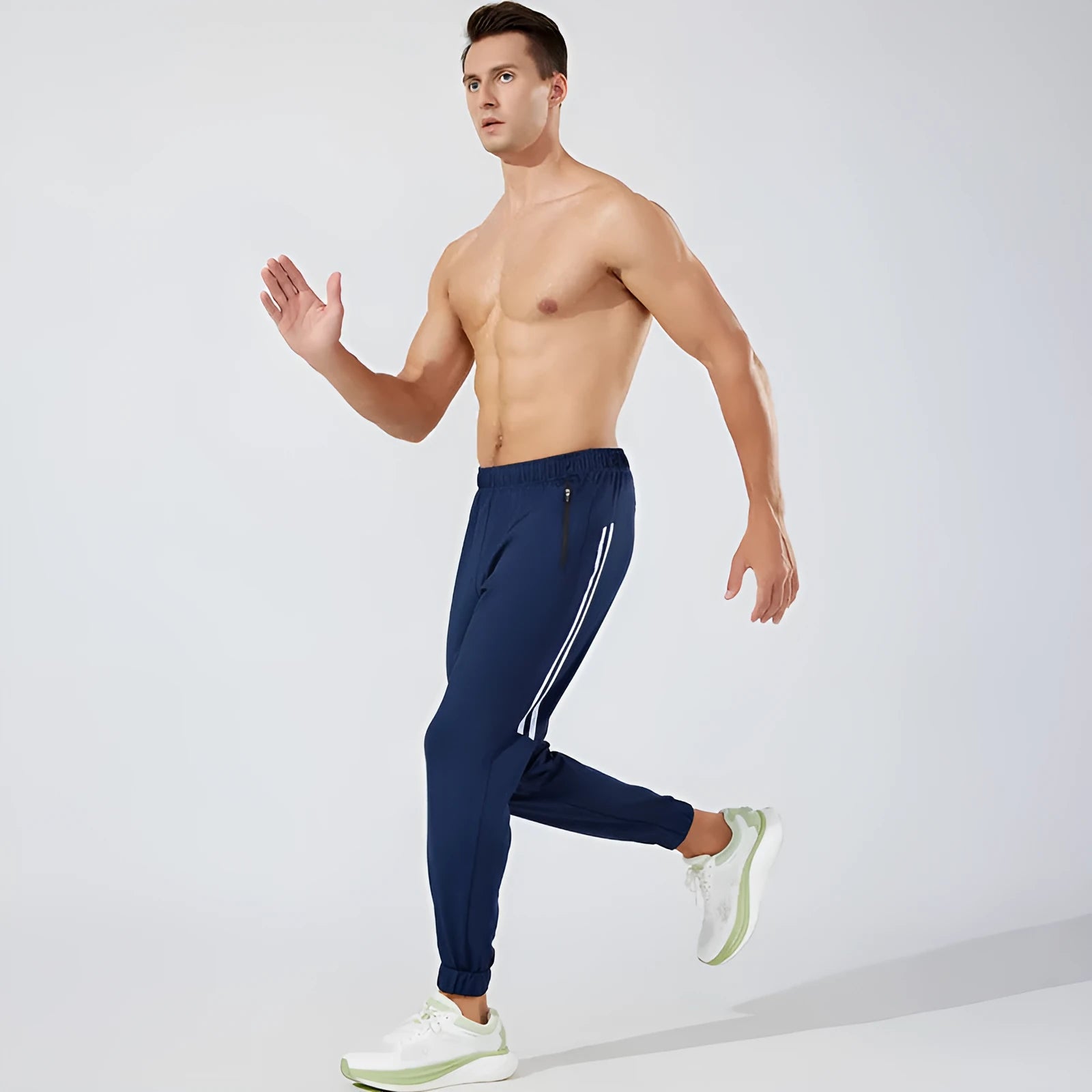 Men's black polyester running trousers with mid-waist design for exercise and gym workouts