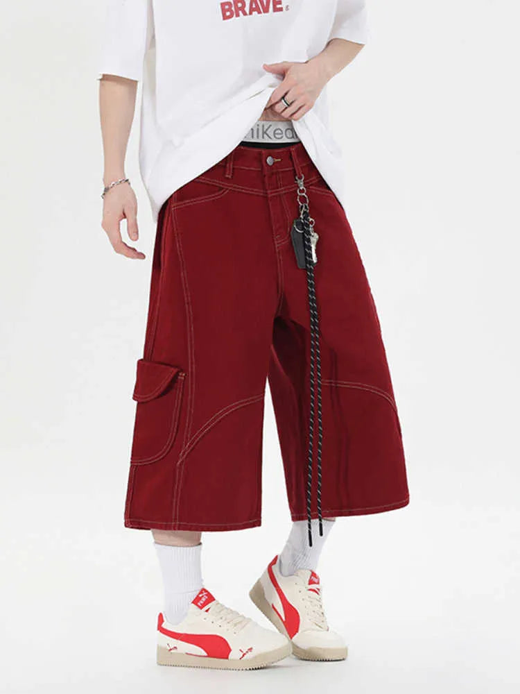 Black and red wide leg denim cropped pants with multiple pockets and mid waist