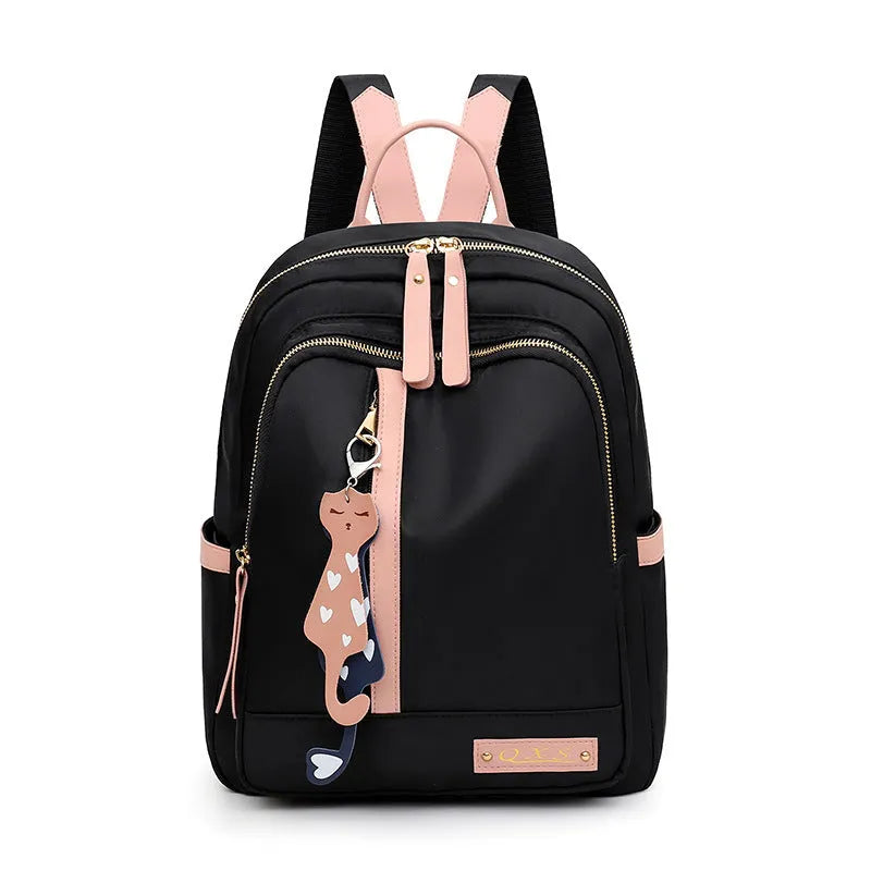 Women's casual nylon backpack in black or pink with square shape, showing external pocket and double straps.