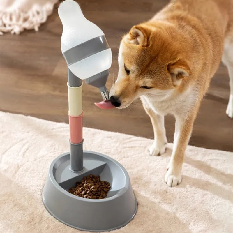 Green adjustable pet water dispenser showing height adjustment bars and ball-tip drinking nozzle